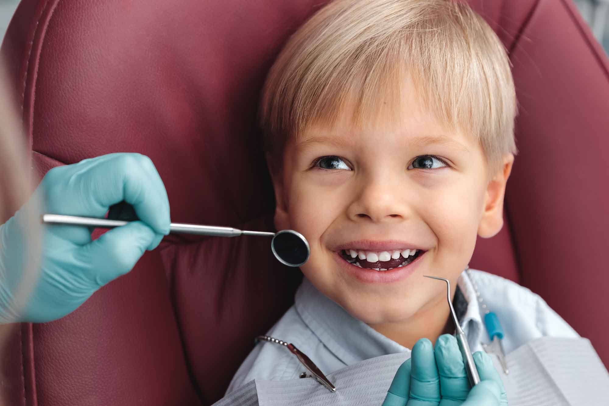 Young boy at a teeth cleaning 